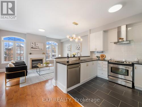 2342 Sutton Drive, Burlington, ON - Indoor Photo Showing Kitchen With Fireplace With Stainless Steel Kitchen With Upgraded Kitchen