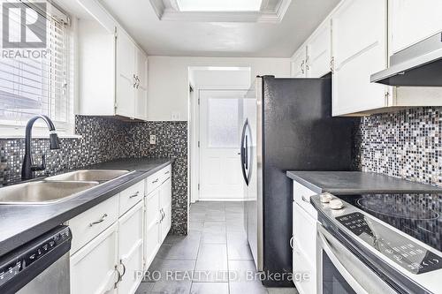 7646 Priory Crescent, Mississauga, ON - Indoor Photo Showing Kitchen With Double Sink