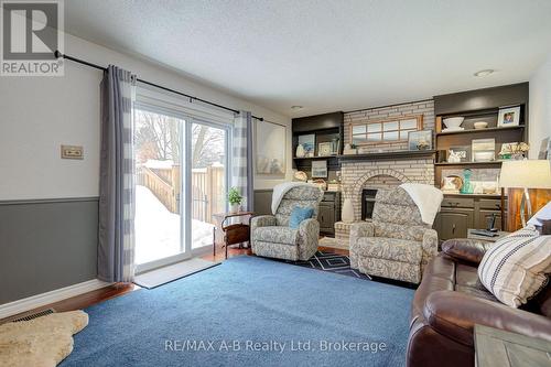 98 Mccarron Crescent, Waterloo, ON - Indoor Photo Showing Living Room With Fireplace