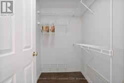 Primary walk-in closet - 