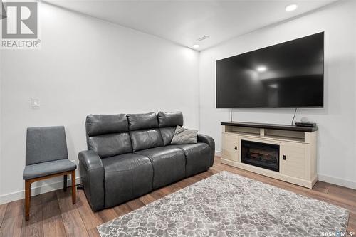 329 2Nd Street E, Saskatoon, SK - Indoor Photo Showing Living Room With Fireplace