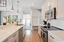 329 2Nd Street E, Saskatoon, SK  - Indoor Photo Showing Kitchen With Double Sink With Upgraded Kitchen 