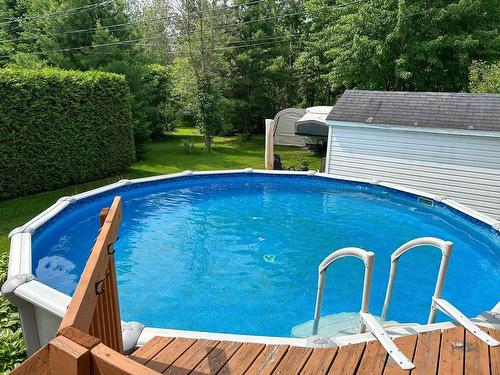 Piscine - 895 Rue Du Faucon, Drummondville, QC - Outdoor With Above Ground Pool With Backyard