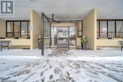 View of snow covered property entrance - 