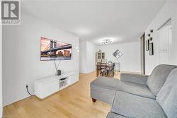 Living room featuring hardwood / wood-style floors - 