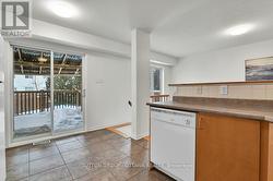 Kitchen with access to back deck and yard - 