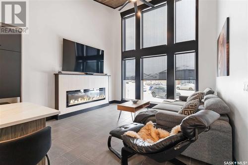 359 Mcarthur Crescent, Saskatoon, SK - Indoor Photo Showing Living Room With Fireplace