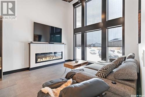 359 Mcarthur Crescent, Saskatoon, SK - Indoor Photo Showing Living Room With Fireplace