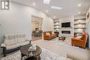 Linear stone framed gas fireplace - 586 Pleasant Park Road, Ottawa, ON  - Indoor Photo Showing Living Room With Fireplace 