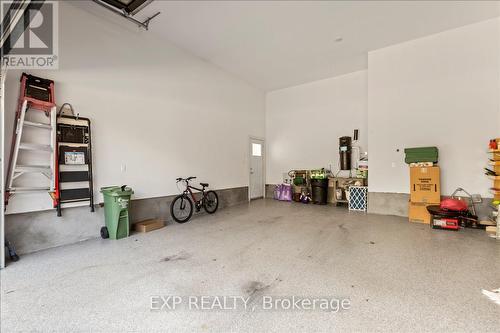 Garage is fully drywalled with heated epoxy floors - 586 Pleasant Park Road, Ottawa, ON - Indoor Photo Showing Garage