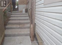 Side Stairs access to backyard / lower unit - 