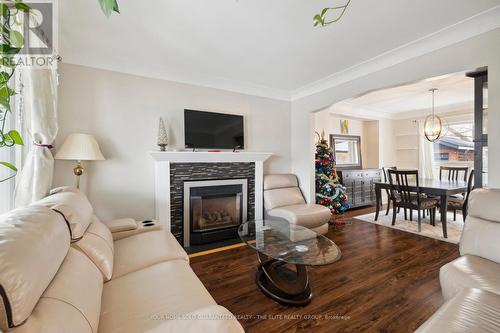 167 Balsam Avenue N, Hamilton, ON - Indoor Photo Showing Living Room With Fireplace