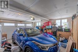 Garage featuring a garage door opener - 