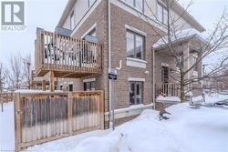 View of snow covered property - 