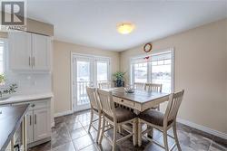 Dining room featuring french doors - 