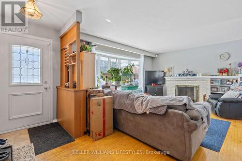 48 Honeysuckle Crescent, London, ON - Indoor Photo Showing Living Room With Fireplace