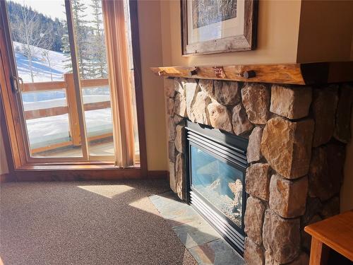 203-2090 Summit Drive, Panorama, BC - Indoor Photo Showing Other Room With Fireplace