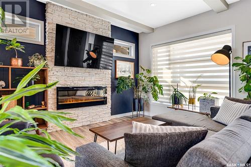 309 Secord Way, Saskatoon, SK - Indoor Photo Showing Living Room With Fireplace