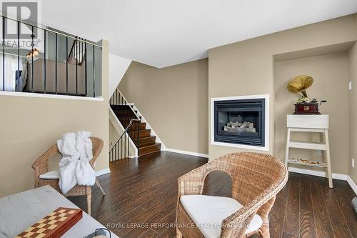 Living room with fireplace - 222 Huntridge, Ottawa, ON - Indoor With Fireplace