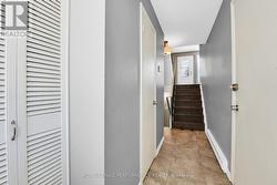 Foyer w/closet, 2 pce Powder Rm, & garage entry - 