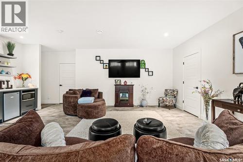 1130 Stadacona Street W, Moose Jaw, SK - Indoor Photo Showing Living Room With Fireplace