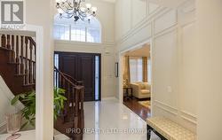 Grand Foyer Open to Above with Custom Double Doors - 