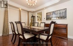 Elegant Dining Room with Coffered Ceilings. - 