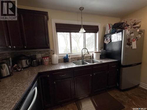 3133 11Th Street W, Saskatoon, SK - Indoor Photo Showing Kitchen With Double Sink