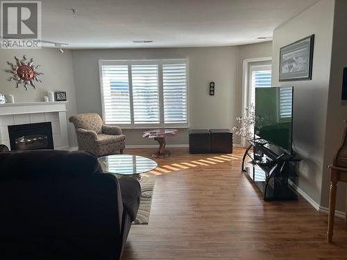 6805 Cottonwood Drive Unit# 408, Osoyoos, BC - Indoor Photo Showing Living Room With Fireplace