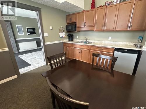 208 825 5Th Street Ne, Weyburn, SK - Indoor Photo Showing Kitchen With Double Sink