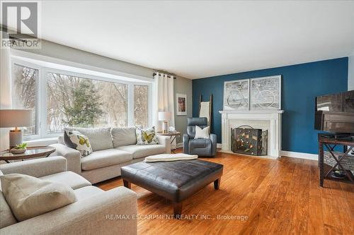 Living Room with Wood burning Fireplace - 300 Shoreview Road, Burlington, ON - Indoor Photo Showing Living Room With Fireplace