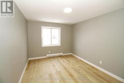 Bedroom with new vinyl flooring - 