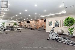 Exercise room featuring recessed lighting, visible vents, and baseboards - 