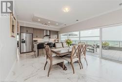 Dining room with recessed lighting, visible vents, baseboards, marble finish floor, and crown molding - 