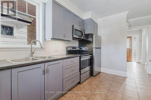 84 South Oval, Hamilton, ON - Indoor Photo Showing Kitchen With Double Sink