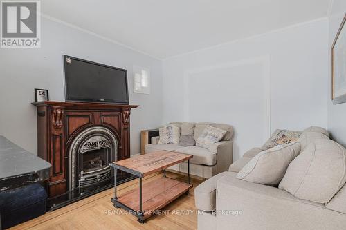 84 South Oval, Hamilton, ON - Indoor Photo Showing Living Room With Fireplace