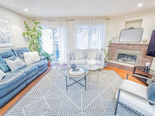 554 Galaxy Crt, Mississauga, ON - Indoor Photo Showing Living Room With Fireplace