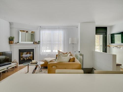 Living room - 31 Ch. Bélisle, Morin-Heights, QC - Indoor Photo Showing Living Room With Fireplace