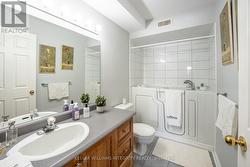 Large ensuite with a high end walk in bathtub - 