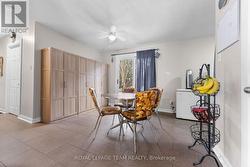 Dining area with patio doors leading to back deck. - 