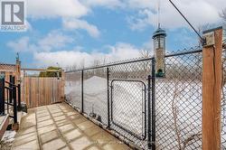 View of patio / terrace featuring a gate and fence - 