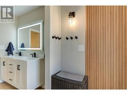 The wood paneling could be removed and there is the Ensuite door behind it. - 