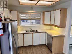 Stainless steel appliances in kitchen. - 