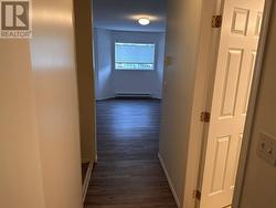 Foyer leads to door to Master Bedroom. Large double closet on left, ensuite bathroom on right. - 