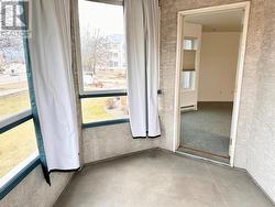 Enclosed patio has curtains and screened windows that open - 