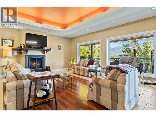 8738 Squilax Anglemont Road, St. Ives, BC - Indoor Photo Showing Living Room With Fireplace