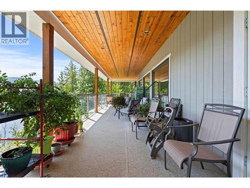 Main floor covered deck - 8738 Squilax Anglemont Road, St. Ives, BC - Outdoor With Deck Patio Veranda With Exterior