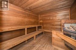 View of sauna featuring wood finished floors - 