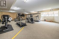 Workout room with carpet, visible vents, and baseboards - 