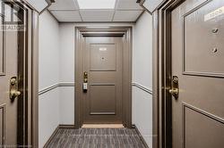 Doorway with a paneled ceiling - 